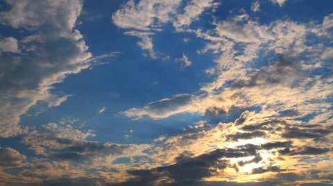 Chipped storm cloud at sunset Stock Footage 28383024