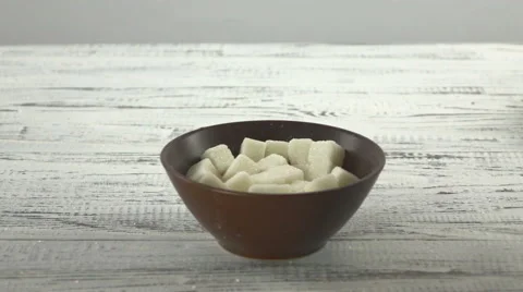 Chipped sugar drops into the cup Stock Footage 58726214