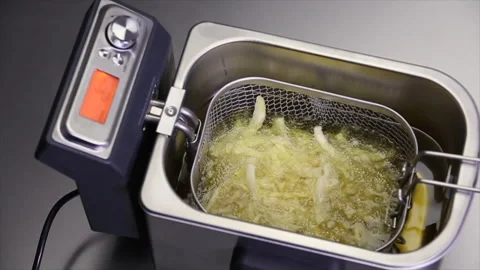 Chipping potatoes frying 1 Stock Footage 280121113