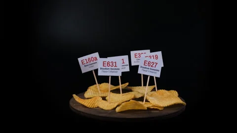 Chips with additive flags on stand rotating Stock Footage 346675065