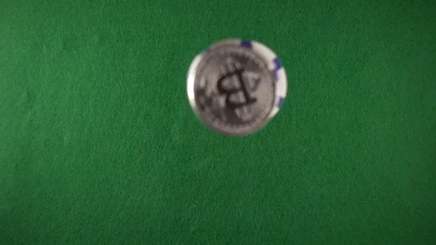 The chips and coins fall down on the cloth top view slow motion Stock Footage 85642097