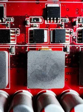 Chips and logical blocks on the red electronic circuit Stock-Fotos