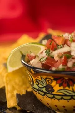 Chips and salsa with lime Stock Photos