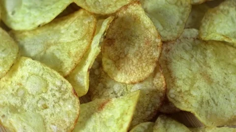 Chips that are spinning in a plate Stock Footage 249764668