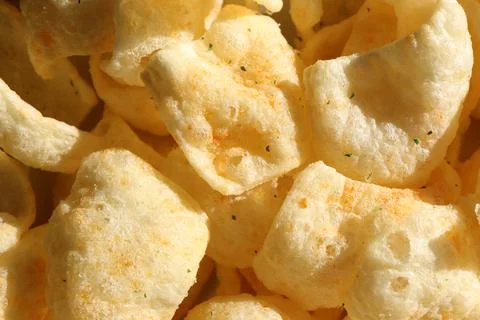 Chips background. Filled snake texture. Foto stock