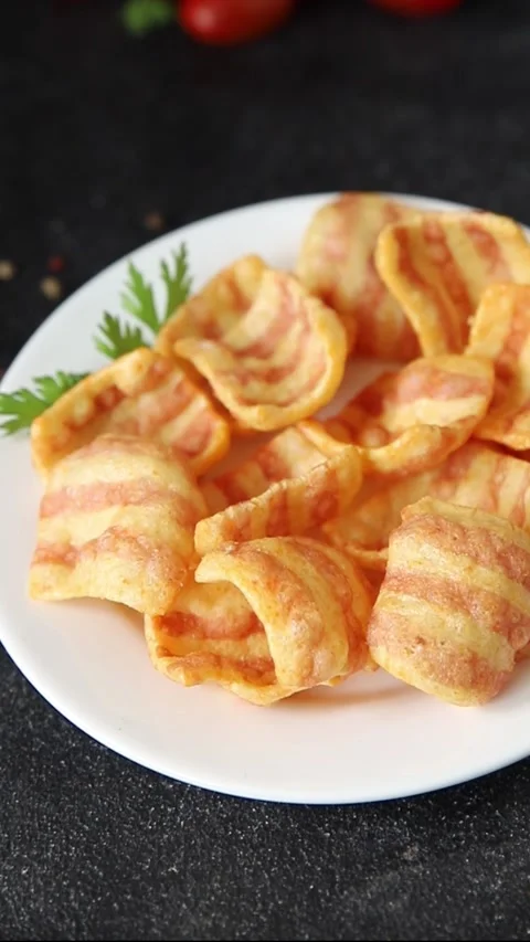 Chips bacon crispy rashers corn tasty snacks fast food natural Stock Footage 308957375