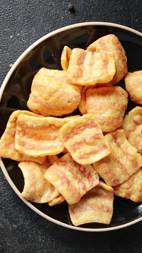 Chips bacon crispy rashers corn tasty snacks fast food natural food Stock Footage 308957382