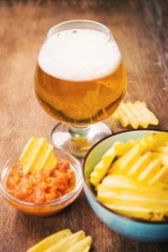 Chips with beer Stock Photos