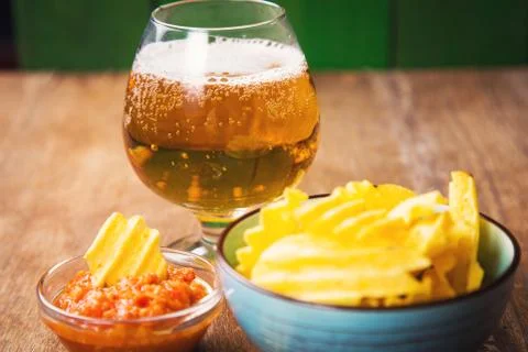 Chips with beer Stock Photos