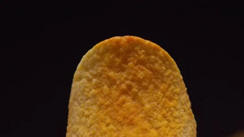 Chips, chips break in half, close-up 120fps 2.6k Stock Footage 130800127