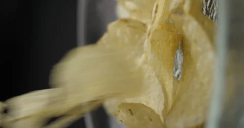 Chips close-up falling in studio 4K vertical view Stock-Footage 277002045