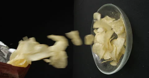 Chips close-up falling in studio 4K vertical view Stock-Footage 277002072