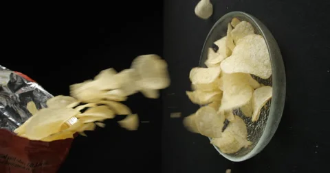 Chips close-up falling in studio 4K vertical view Stock-Footage 277002133