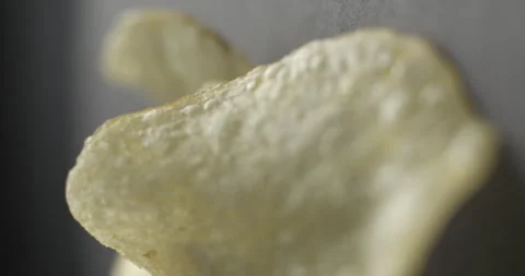Chips close-up rotating in studio 4K 스톡 동영상 277003534