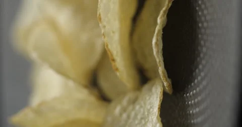 Chips close-up rotating in studio 4K vertical view Stock-Footage 277003913