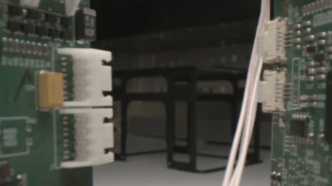 Chips connected with flexible flat cables at testing in shop Stock Footage 163581996