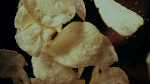 Chips Fall, Bounce, and Break Stock Footage 300886559
