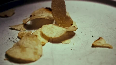 Chips Fall on a Dinner Plate Stock Footage 300889614