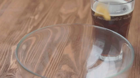 Chips falling into bowl in slow motion Stock Footage 68955526