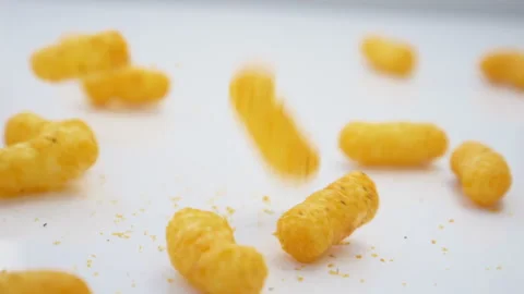 Chips falling down on glass plate in Slow Motion Stock Footage 139811024