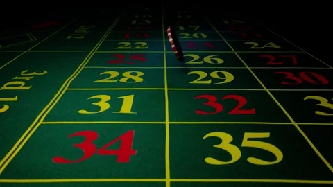 Chips falling on a green table in casino Stock Footage 71054849