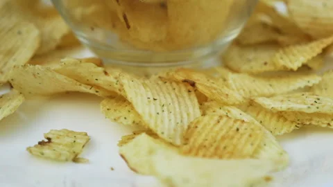 Chips. gold ruffles potato chips rotating close up Video stock 139812727