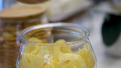 Chips jar lid Eating Chips From Bowl While . Female Eating Unhealthy Potatoes Stock-Footage 316063989