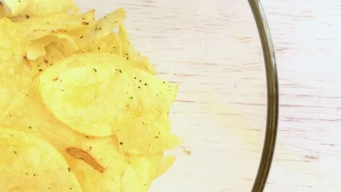 Chips in a large transparent plate. fried potato. Stock Footage 134705718