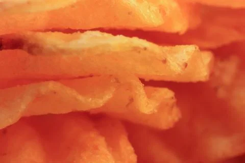 Chips macro closeup background. Fried potato recipe. Snack. Food Stock Photos