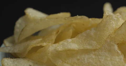 Chips picking close-up in studio 4K Stock-Footage 277002321