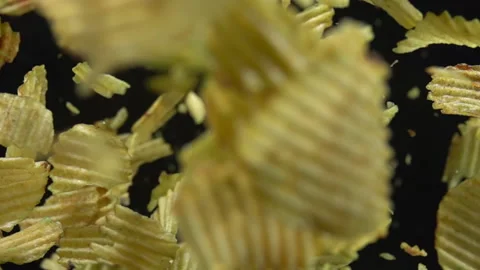 Chips scatter in the air. Slow motion 500 fps Vídeo Stock 152788494