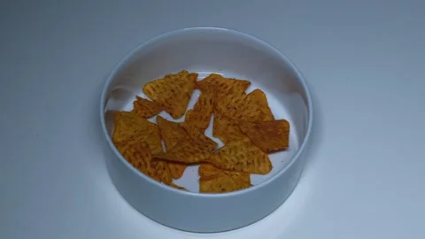 Chips scattered on plate Stock Footage 249801322