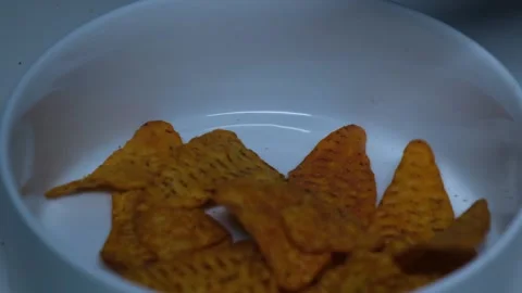 Chips scattered on plate Stock Footage 249801703