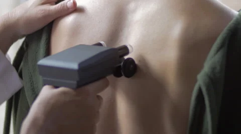 Chiropractor Scans Spine Stock Footage 40296664