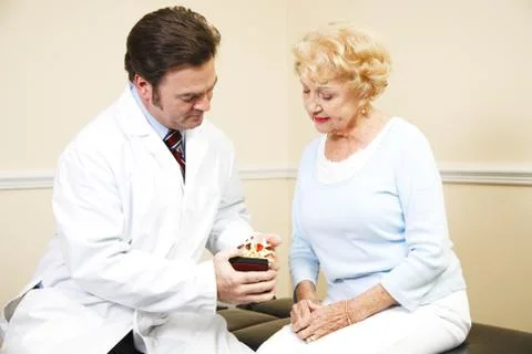 Chiropractor with Spine Model Stock Photos