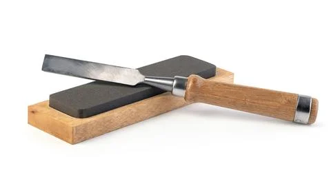 Chisel and whetstones on white background Stock Photos