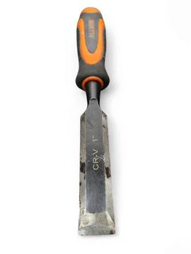 Chisel carpentry with black and orange rubber handle isolated Stock Photos