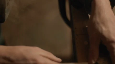 Chisel a chamfer on a wooden block with pencil marks Video stock 169156497