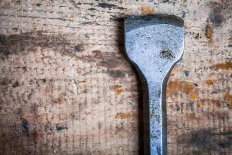 Chisel on wooden plank Stock Photos