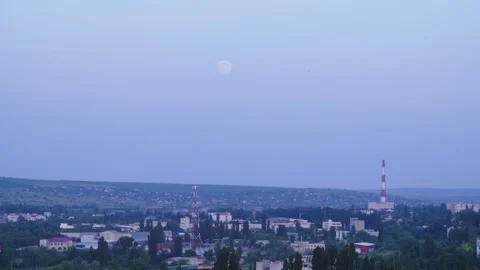 Chisinau in the evening with a moon in the sky Stock Footage 229190947
