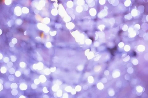 Chistmast pattern background concept. Bokeh of pink and purple tone light. Stock Photos