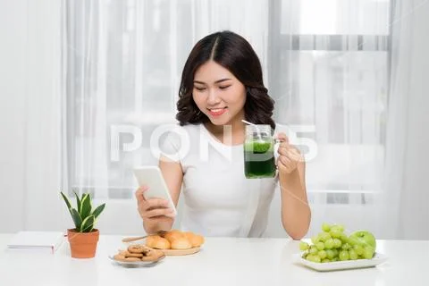 Chit-chat with her friends. Woman talking on her cellphone while having break Stock Photos
