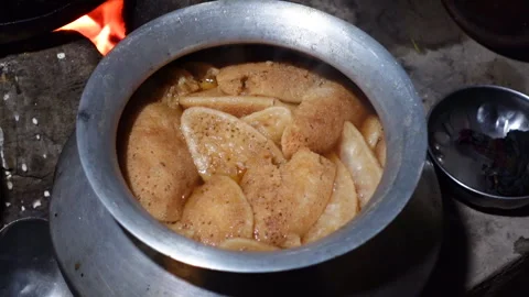 The Chitai Pitha was dipped in it, now milk Stock Footage 341699140