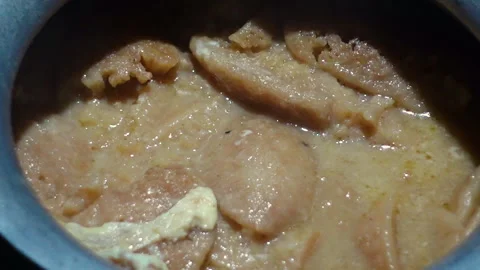 The Chitai Pitha was dipped in it, now milk Stock Footage 341699717