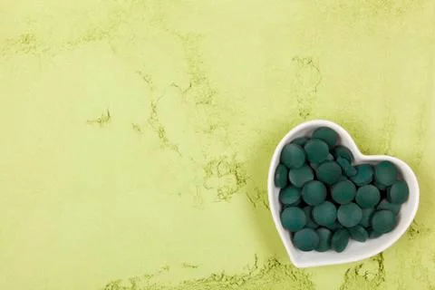 Chlorella and spirulina background. Stock Photos