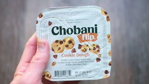Chobani yogurt lowfat cookie dough vanilla lowfat yoghurt closeup Stock Footage 336780963