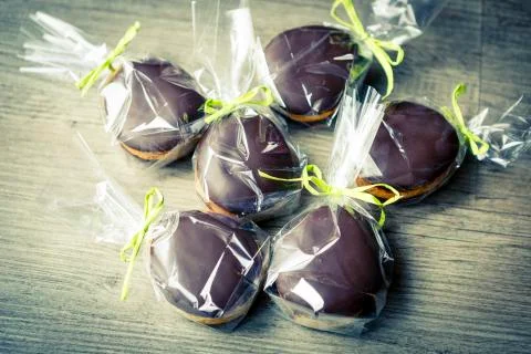Chocholate and gingerbread easter eggs in plastic bags  Stock Photos