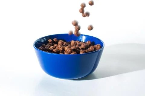 Choco cereals in blue cup Stock Photos