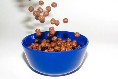 Choco cereals in blue cup Stock Photos