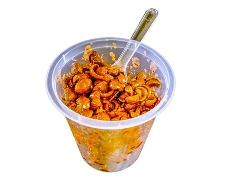 Choco jar snacks covered in chocolate in a small transparent container Stock Photos